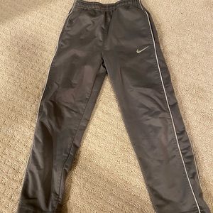 Boys Nike gray track pants.